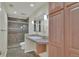 Bathroom featuring a glass shower, vanity and bright lights at 11017 Meade Ct, Westminster, CO 80031