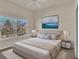 Cozy bedroom featuring a serene view, plush bed, and stylish decor at 11017 Meade Ct, Westminster, CO 80031