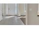 Light-filled foyer featuring tile flooring, a front door with decorative glass, and neutral paint colors at 11017 Meade Ct, Westminster, CO 80031