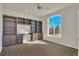 Bright home office featuring custom built-ins and a large window with a view of the outdoors at 11017 Meade Ct, Westminster, CO 80031
