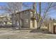 Inviting exterior of a two-story home featuring a quaint balcony and natural surroundings at 4529 Barnacle Ct, Boulder, CO 80301