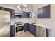 Modern kitchen with stainless steel appliances, ample counter space, and stylish cabinetry at 4529 Barnacle Ct, Boulder, CO 80301