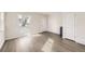 Bright living room with new flooring, a large window, and fresh paint at 4529 Barnacle Ct, Boulder, CO 80301