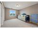 Neutral bedroom featuring a day bed, a large window with pleasant neighborhood views at 7086 Esperanza Dr, Castle Pines, CO 80108