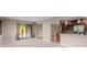 Open living space showcasing a modern kitchen and backyard views at 8231 E Lehigh Dr, Denver, CO 80237