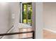 Sliding glass doors with view of lush backyard at 8231 E Lehigh Dr, Denver, CO 80237