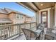Cozy balcony with seating, offering a relaxing outdoor space with neighborhood views at 9012 Borrowdale Ln, Parker, CO 80134