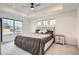 Spacious bedroom with recessed lighting, ceiling fan, and large windows at 9012 Borrowdale Ln, Parker, CO 80134