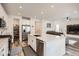 Bright kitchen with stainless steel appliances and white cabinets provides ample storage at 9012 Borrowdale Ln, Parker, CO 80134