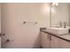 Bathroom with sleek square sink, gray countertop, and modern fixtures at 1840 Irving St, Denver, CO 80204