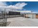Expansive rooftop deck offering ample space for outdoor living and entertainment at 1840 Irving St, Denver, CO 80204