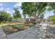 Charming single-story home with well-maintained yard and mature trees, located on a quiet street at 5240 Dudley St, Arvada, CO 80002