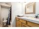 Clean bathroom with light-colored tile, vanity, and shower and tub offering a functional and comfortable space at 1833 N Williams St # 101, Denver, CO 80218