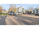Exterior view of the building with parking lot at 14046 E Stanford Cir # I04, Aurora, CO 80015