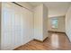 Bedroom features hardwood floors, access to another room, and a closet at 4351 E 109Th Ave, Thornton, CO 80233