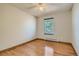Bedroom with hardwood floors and a window for natural light at 4351 E 109Th Ave, Thornton, CO 80233