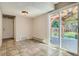 Bright dining area with tile floors, access to the backyard, and backyard views at 4351 E 109Th Ave, Thornton, CO 80233