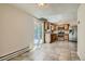 Eat-in kitchen with tile floors, stainless steel appliances, and sliding doors to the backyard at 4351 E 109Th Ave, Thornton, CO 80233