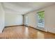 Bright and airy living room with hardwood floors and large windows at 4351 E 109Th Ave, Thornton, CO 80233