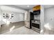 Open kitchen area with stainless steel appliances and ample counter space at 832 Dahlia St, Denver, CO 80220