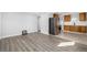 Open-concept living area with updated flooring and seamless flow to the kitchen at 832 Dahlia St, Denver, CO 80220