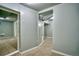 This basement features neutral carpet and paint plus access to additional storage space at 504 Martin St, Longmont, CO 80501