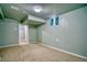 Bedroom featuring neutral carpet, and a small window providing natural light at 504 Martin St, Longmont, CO 80501
