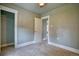 A neutral-toned bedroom features neutral carpet, and a closet at 504 Martin St, Longmont, CO 80501