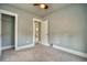 A neutral-toned bedroom features neutral carpet, and a closet at 504 Martin St, Longmont, CO 80501