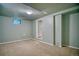 Bedroom featuring neutral carpet, and a small window providing natural light at 504 Martin St, Longmont, CO 80501