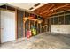 Interior of a detached garage featuring built-in shelving, storage space, and a workbench at 504 Martin St, Longmont, CO 80501