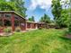 Expansive backyard featuring a charming gazebo, lush lawn, mature trees and privacy at 9656 Rensselaer Dr, Arvada, CO 80004