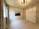 Neutral bedroom features a window with curtains and a closet with sliding doors at 4049 S Quatar St, Aurora, CO 80018