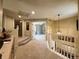 Second-floor hallway with access to multiple rooms, carpeted floors and ample natural light at 4049 S Quatar St, Aurora, CO 80018