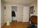 Bedroom with closet, rolltop desk, hardwood floors, and plenty of storage at 2201 Sable Blvd # 1007, Aurora, CO 80011
