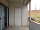 Exterior patio showcasing a door and slider to the building's exterior at 2201 Sable Blvd # 1007, Aurora, CO 80011