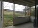 Covered patio with sliding door leading to yard with a view at 2201 Sable Blvd # 1007, Aurora, CO 80011