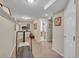 Finished basement offers versatile space with neutral paint, carpeted floor, and access to a bathroom at 2409 S Halifax Way, Aurora, CO 80013