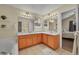 Bright bathroom with double vanity, bathtub and tile flooring at 2409 S Halifax Way, Aurora, CO 80013