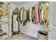 Walk-in closet with ample shelving for clothing and storage at 2409 S Halifax Way, Aurora, CO 80013