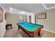 Recreational game room with a classic billiards table for entertainment at 2409 S Halifax Way, Aurora, CO 80013