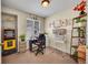 Functional office with ample light and unique decor accents at 2409 S Halifax Way, Aurora, CO 80013