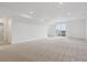 Expansive basement area featuring walkout access to the yard and natural light from windows at 39202 Clymer St, Elizabeth, CO 80107