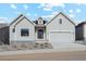 Charming single-Gathering home with a well-manicured front yard and a two-car garage at 616 Scrubjay Cir, Castle Rock, CO 80104