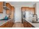Modern kitchen with stainless steel appliances and ample cabinet space at 616 Scrubjay Cir, Castle Rock, CO 80104