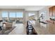Open kitchen with granite countertops, stainless steel appliances, and a large island at 616 Scrubjay Cir, Castle Rock, CO 80104