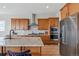 Spacious kitchen with stainless steel appliances and light wood cabinets at 616 Scrubjay Cir, Castle Rock, CO 80104