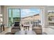 Comfortable seating area with an expansive view from the interior of a home at 616 Scrubjay Cir, Castle Rock, CO 80104