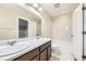 Bathroom features double sinks, a large mirror, and a shower/tub combo at 2356 W 165Th Pl, Broomfield, CO 80023
