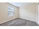 Bedroom with neutral walls, plush carpet, and a window with blinds at 2356 W 165Th Pl, Broomfield, CO 80023